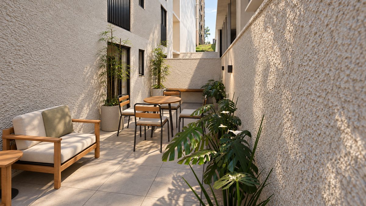 Garden do tipo D: terraço descoberto com piso claro, poltrona de madeira, mesa com cadeiras e vasos com plantas